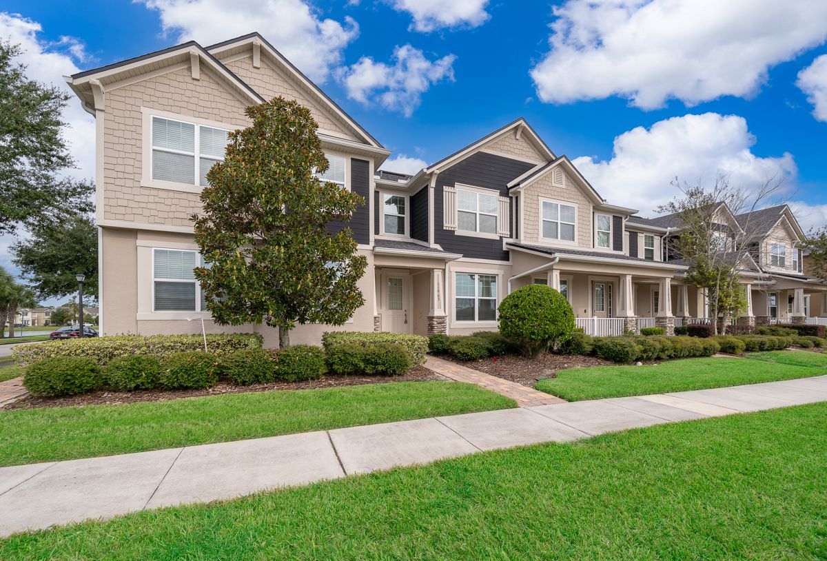Corner-lot townhome, front porch and lawn